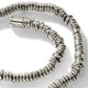 Close-up of hand-cut 4mm sterling silver Heishi beads
