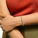 Model wearing the John Hardy Lovestruck Heishi bracelet