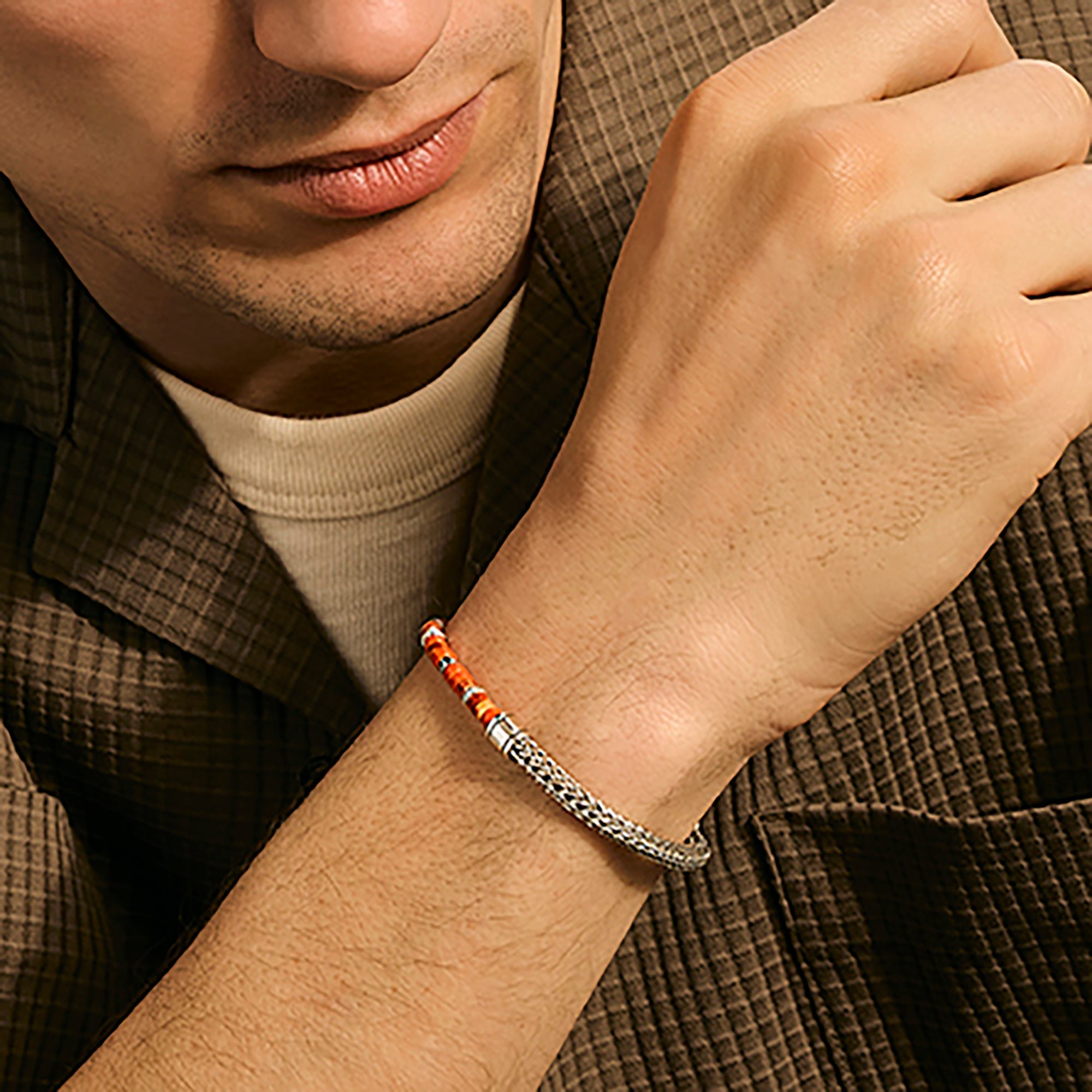 Model wearing the John Hardy Heishi spiny oyster shell chain bracelet