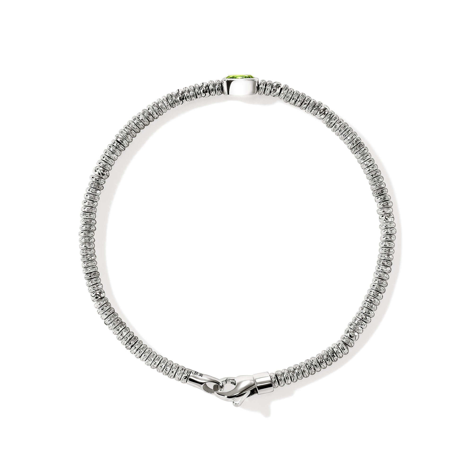 Overhead view of the John Hardy Heishi peridot rondel bracelet