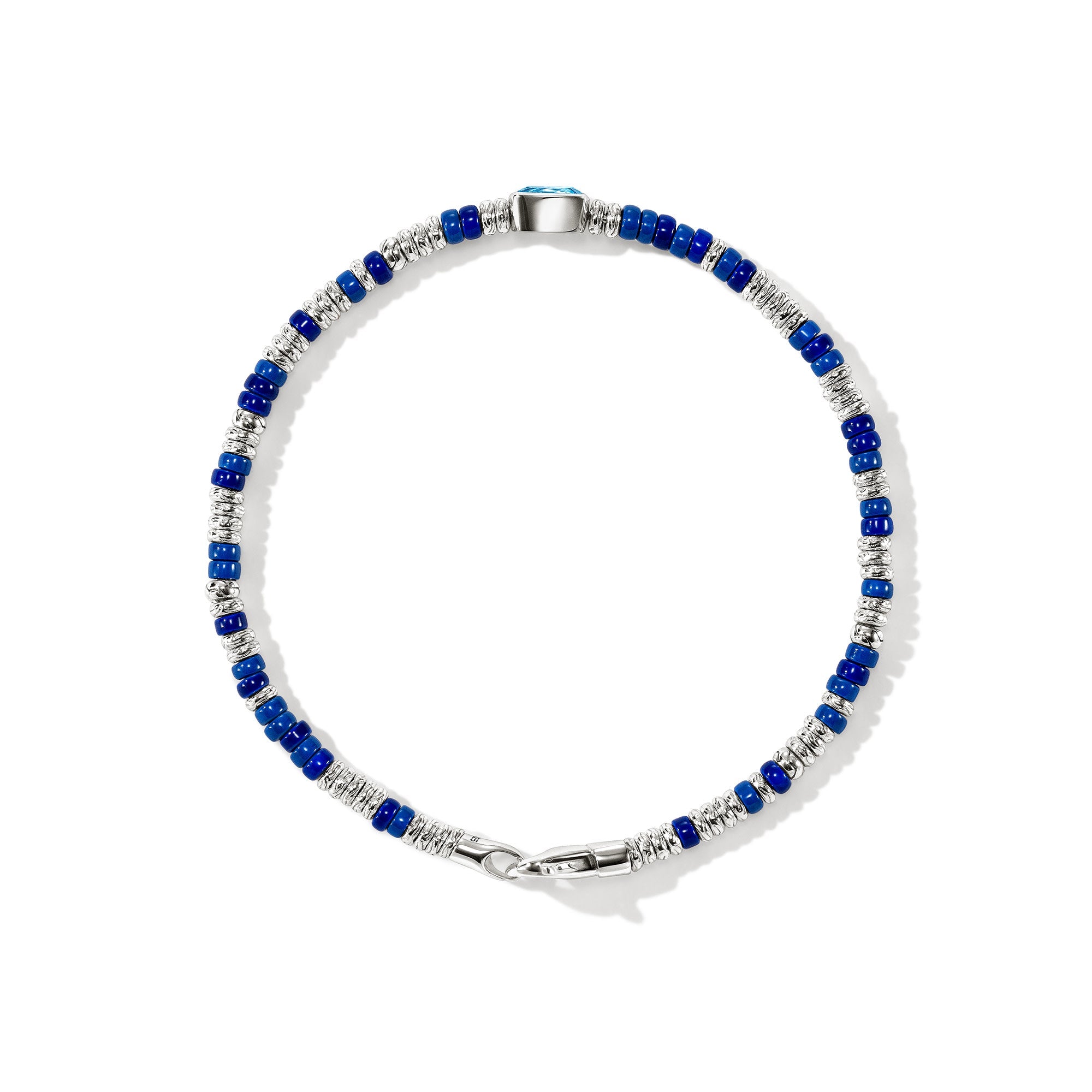 Overhead view of the John Hardy Heishi Swiss blue topaz bracelet