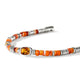 Close-up of the cushion-cut orange citrine center stone and spiny oyster shell beads
