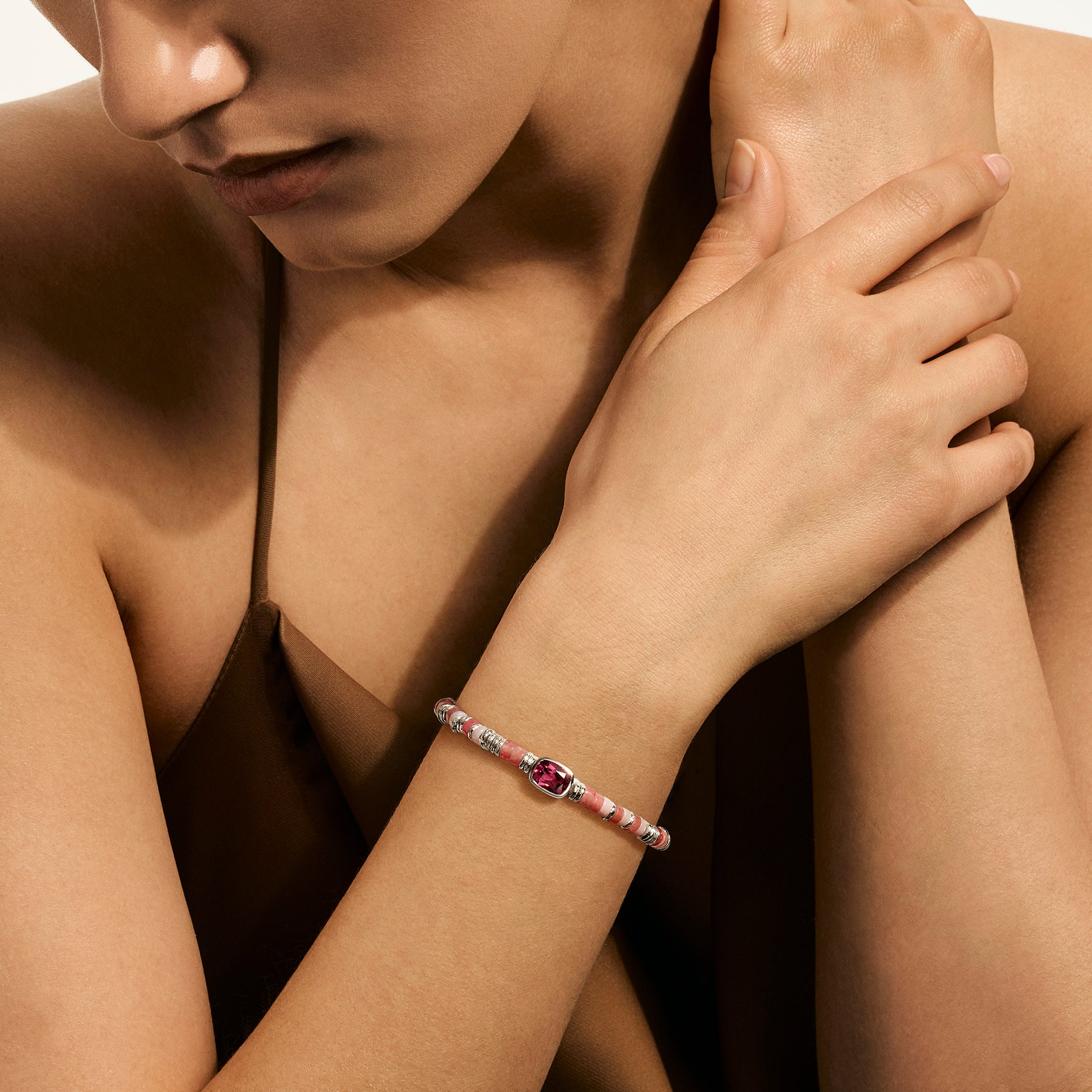 Model wearing the John Hardy Heishi rhodolite bracelet