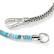 Close-up of turquoise beads and sterling silver Heishi chain