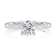 Top view of a 14K white gold four-prong solitaire engagement ring with a round center diamond