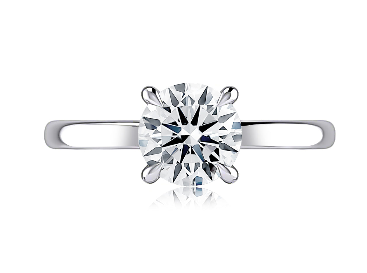Top view of a 14K white gold four-prong solitaire engagement ring with a round center diamond