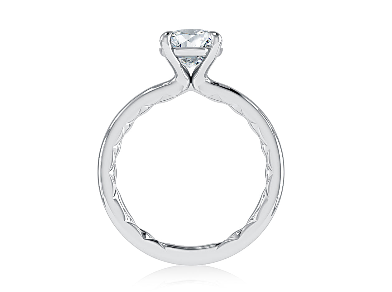 Side view of a 14K white gold four-prong solitaire engagement ring setting