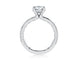 Side view of a 14K white gold four-prong solitaire engagement ring setting