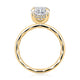 Side view of a 14K yellow gold engagement ring setting showing the hidden halo beneath the center stone