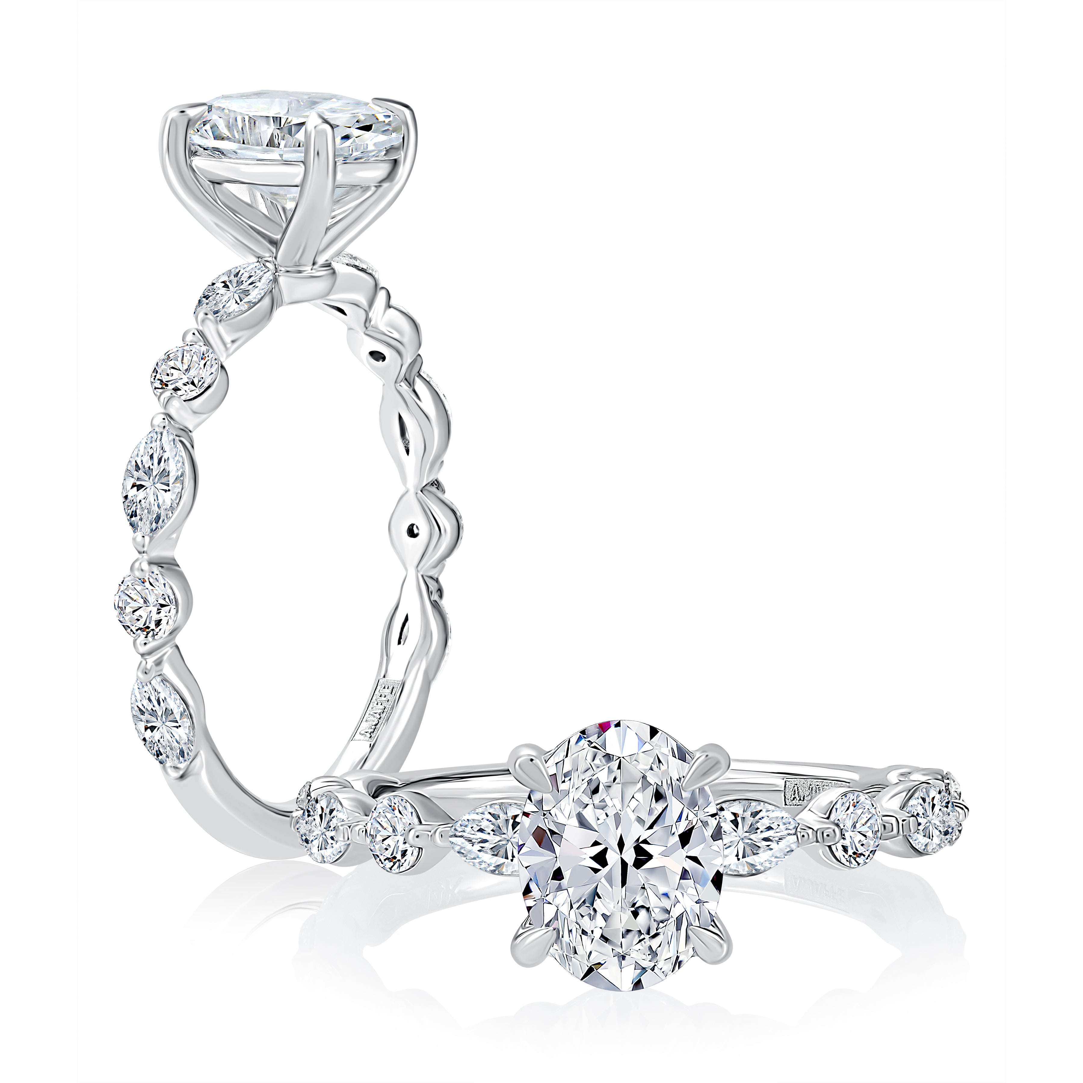 14K white gold engagement ring setting with diamonds along the band and an oval center diamond, shown standing and lying flat