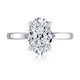 Top view of a 14K white gold hidden halo engagement ring with an oval center diamond