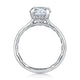 Side view of a 14K white gold engagement ring setting showing the hidden halo of small diamonds beneath the center stone