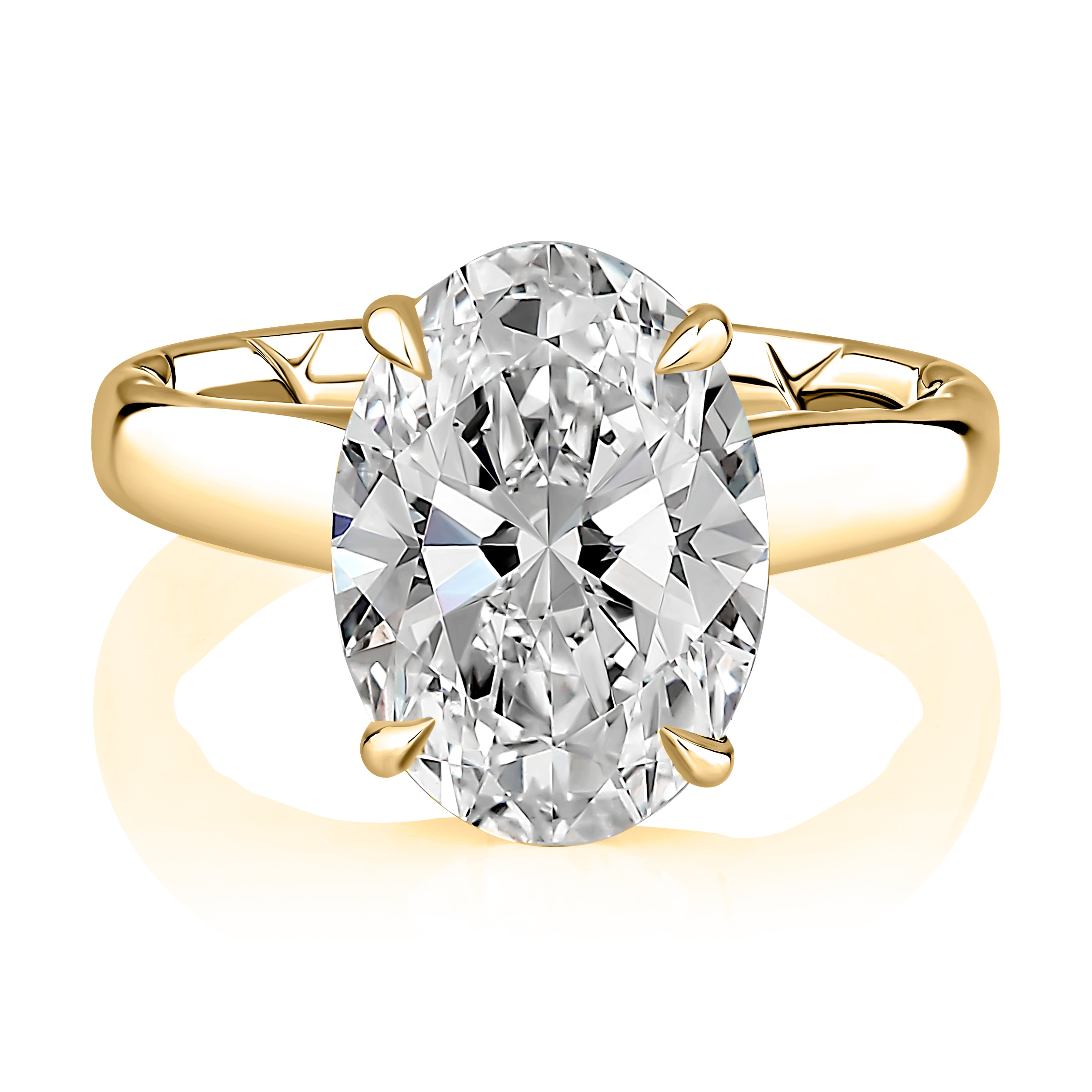 Top view of a 14K yellow gold hidden halo engagement ring with an oval center diamond