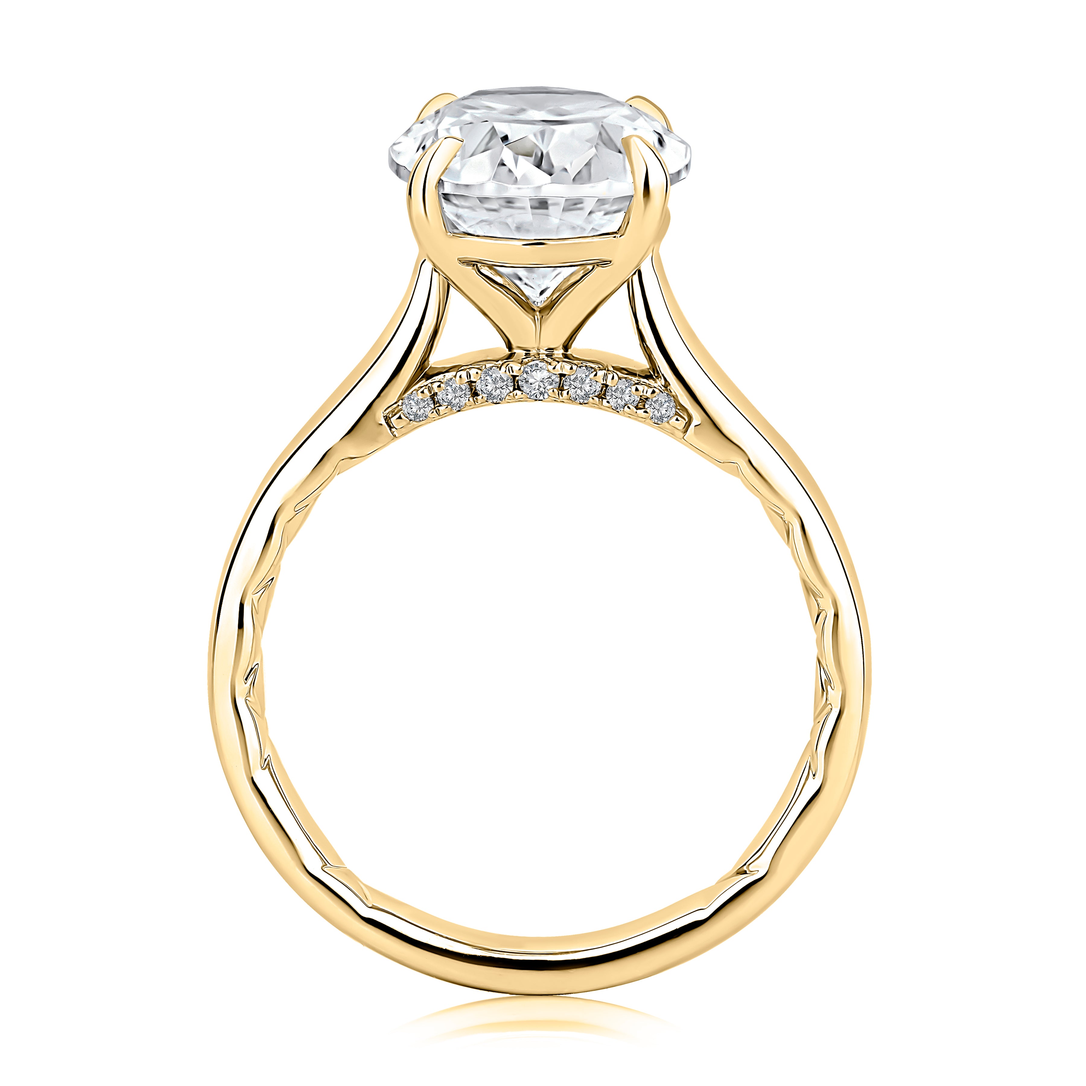 Side view of a 14K yellow gold engagement ring setting showing the hidden halo beneath the center stone