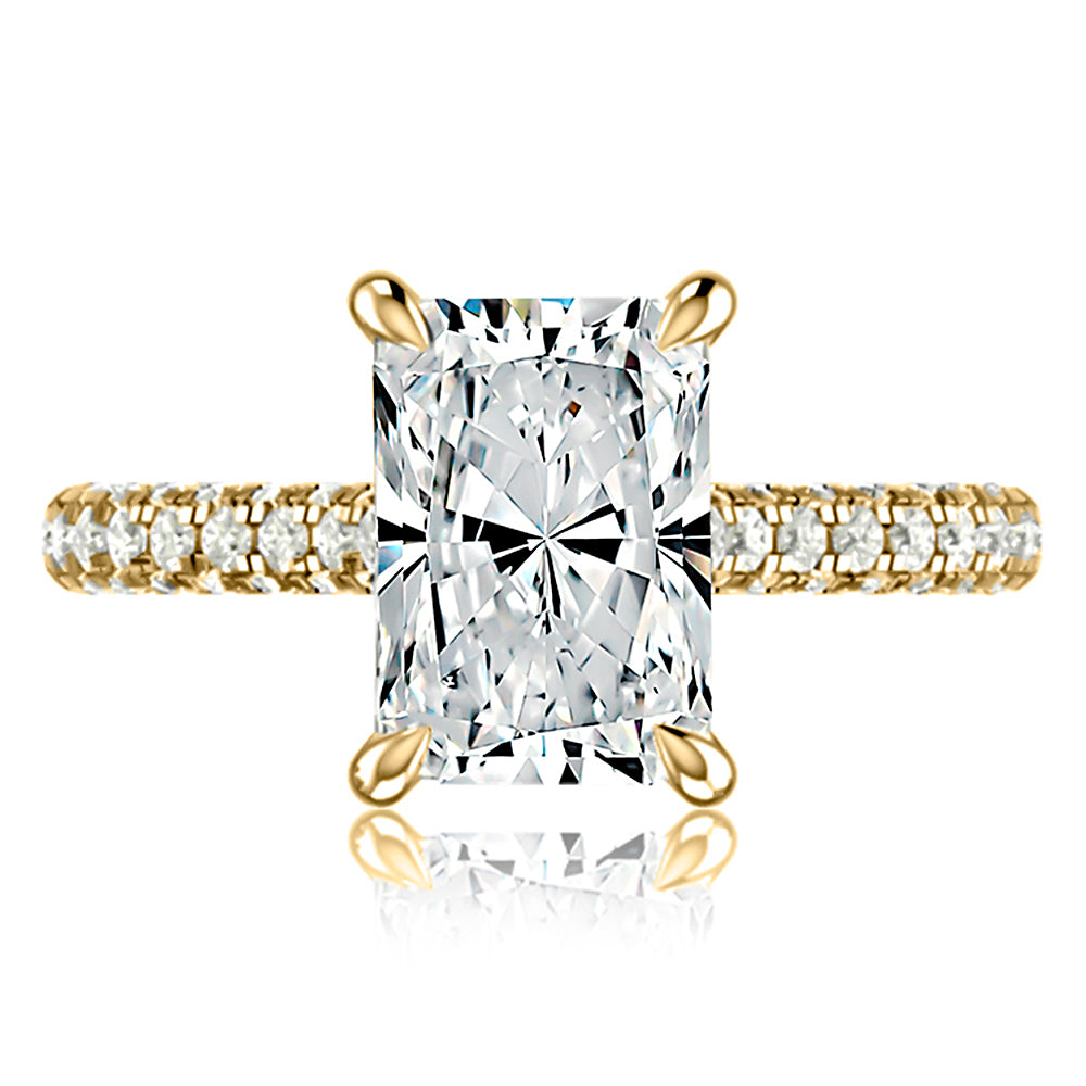 Top view of a 14K yellow gold engagement ring setting with a radiant center diamond