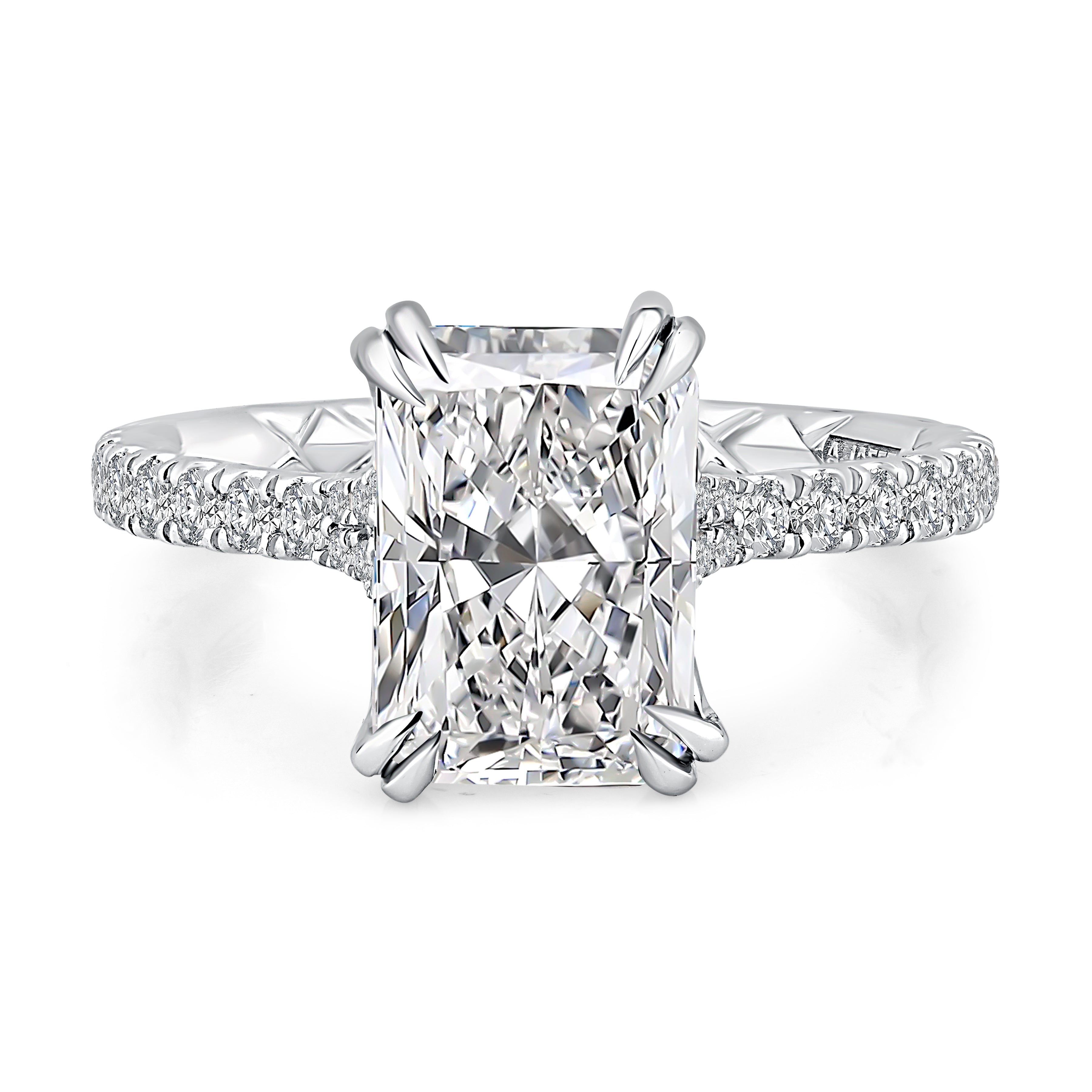 Top view of a 14K white gold engagement ring setting with an elongated radiant center diamond