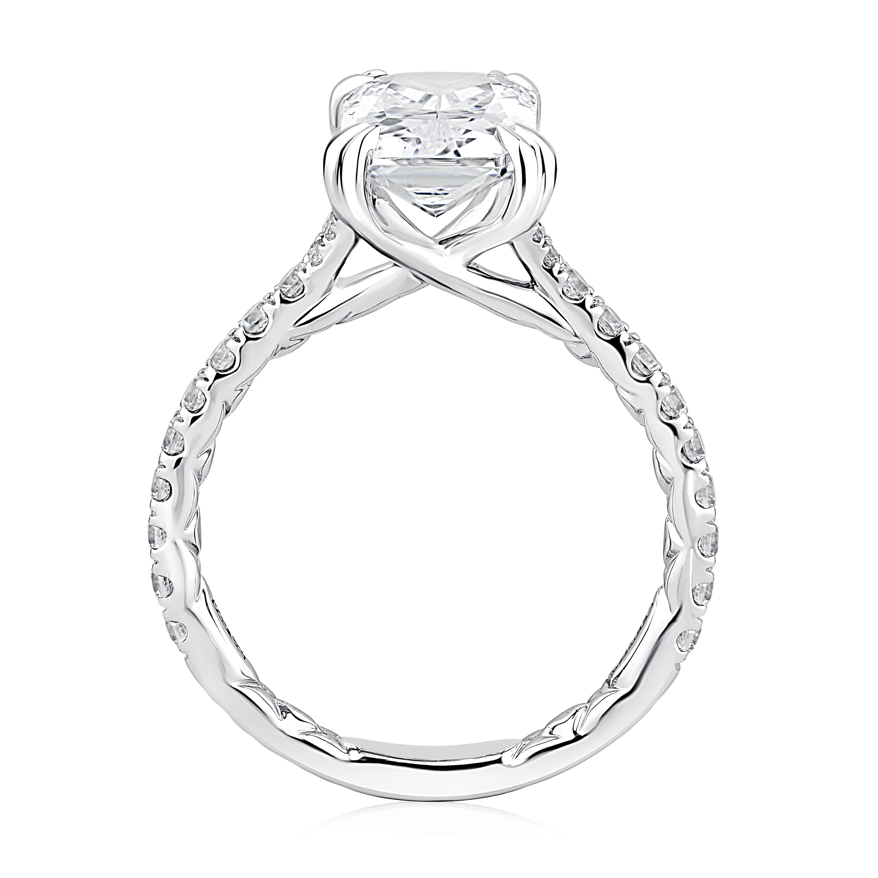 Side view of a 14K white gold elongated radiant engagement ring setting with a pave diamond band