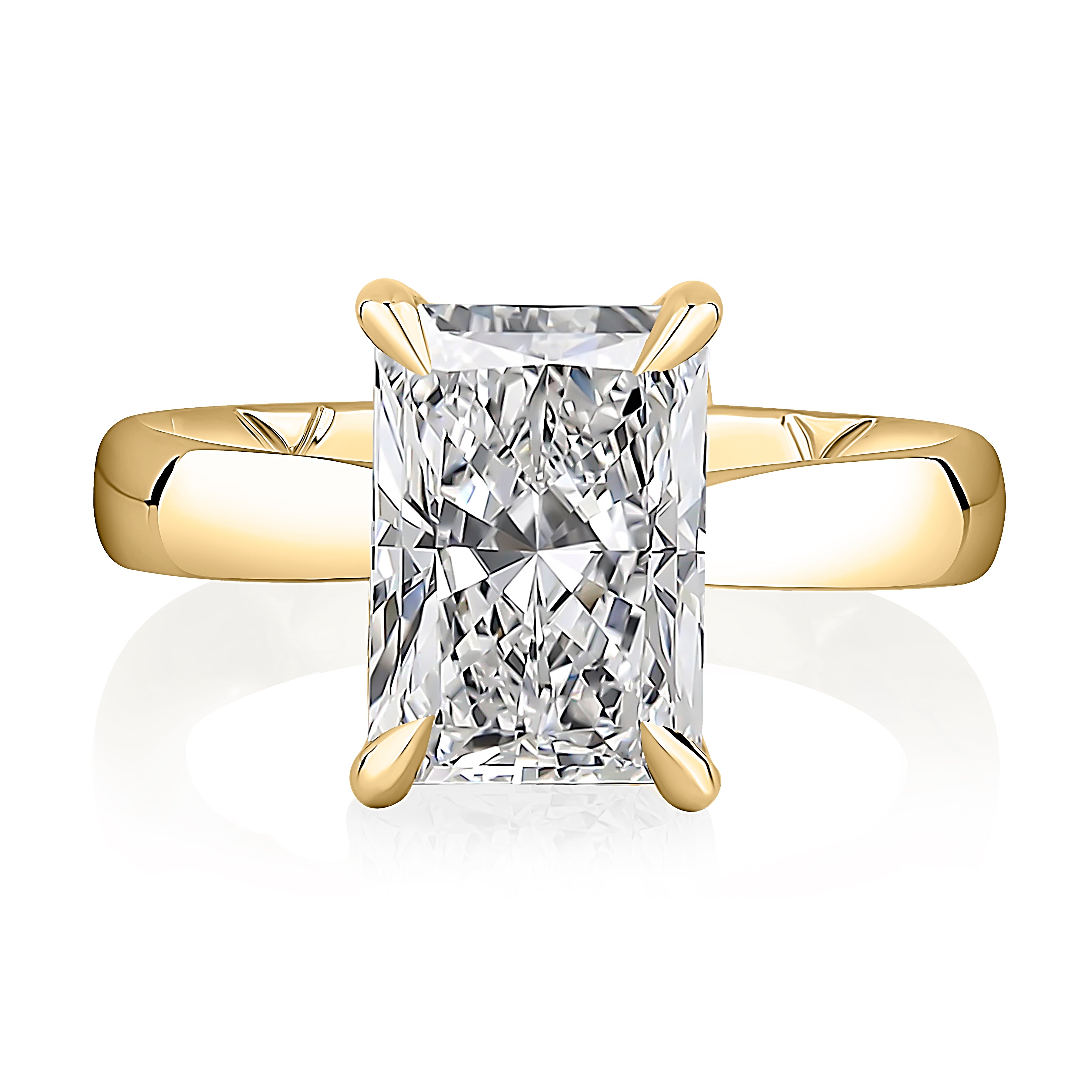 Top view of a 14K yellow gold engagement ring setting with an elongated radiant center diamond