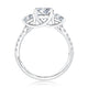 Side view of a 14K white gold three-stone engagement ring setting with a pave diamond band