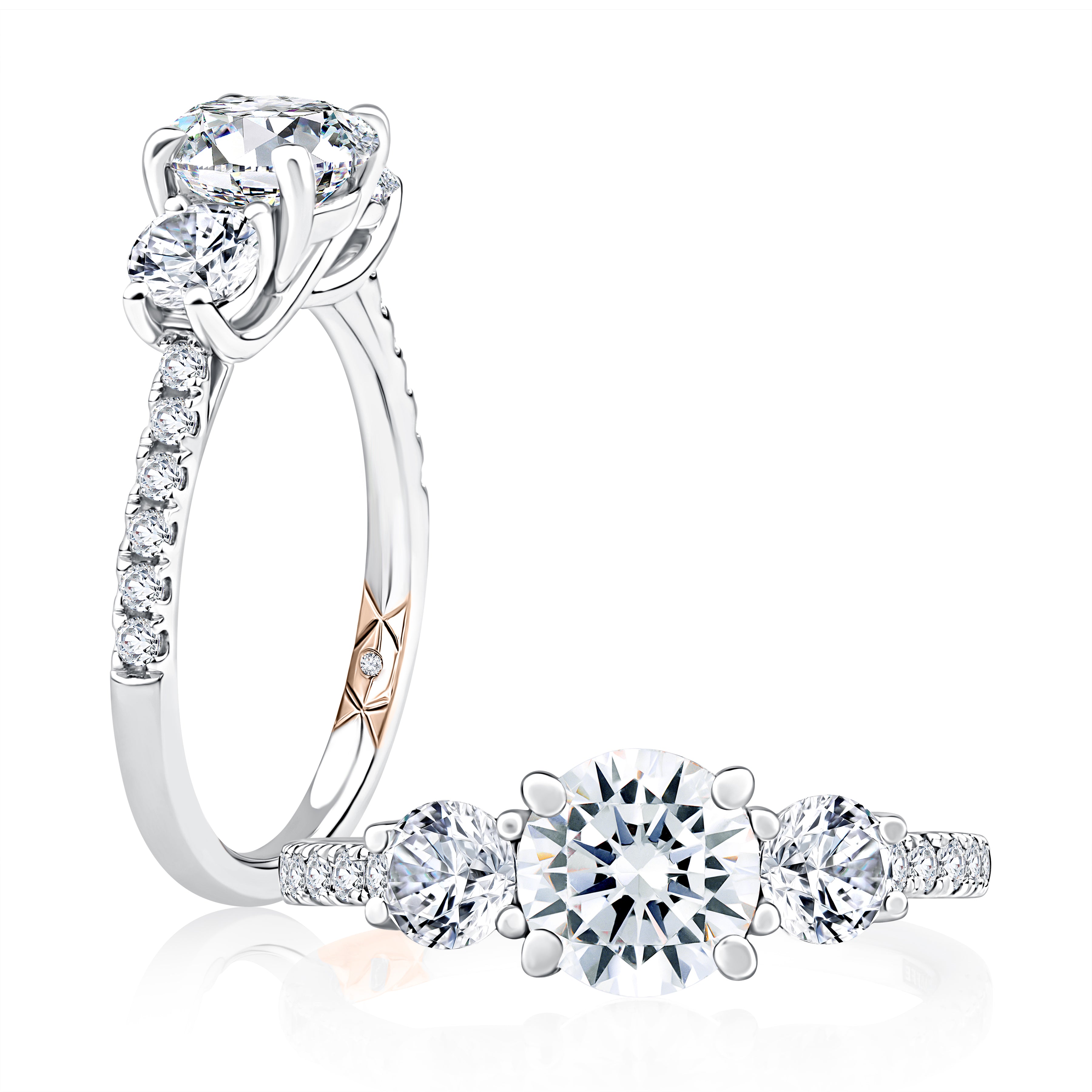 14K white gold three-stone engagement ring setting with a pave diamond band, shown standing and lying flat