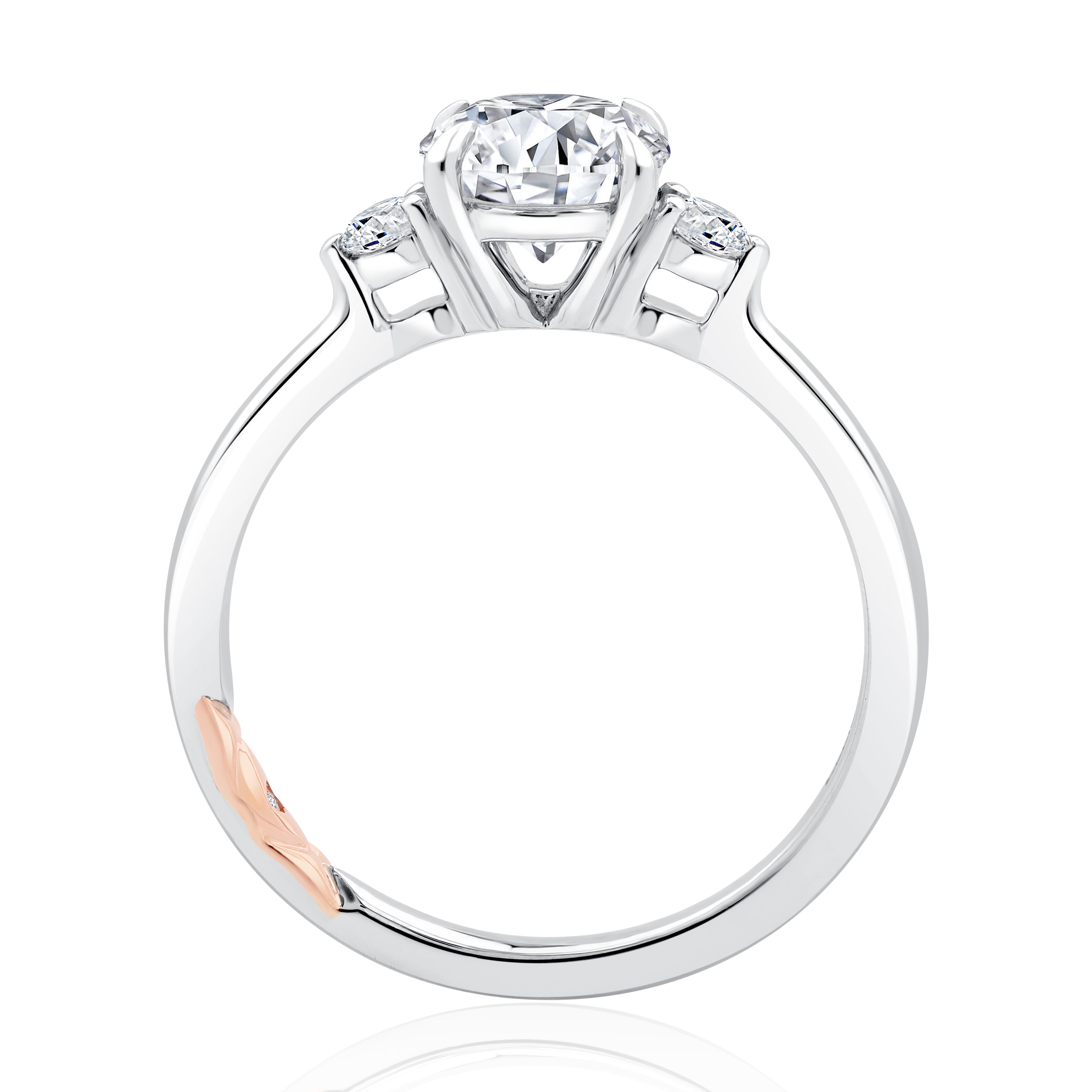 Side view of a 14K white gold three-stone engagement ring setting