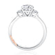 Side view of a 14K white gold three-stone engagement ring setting