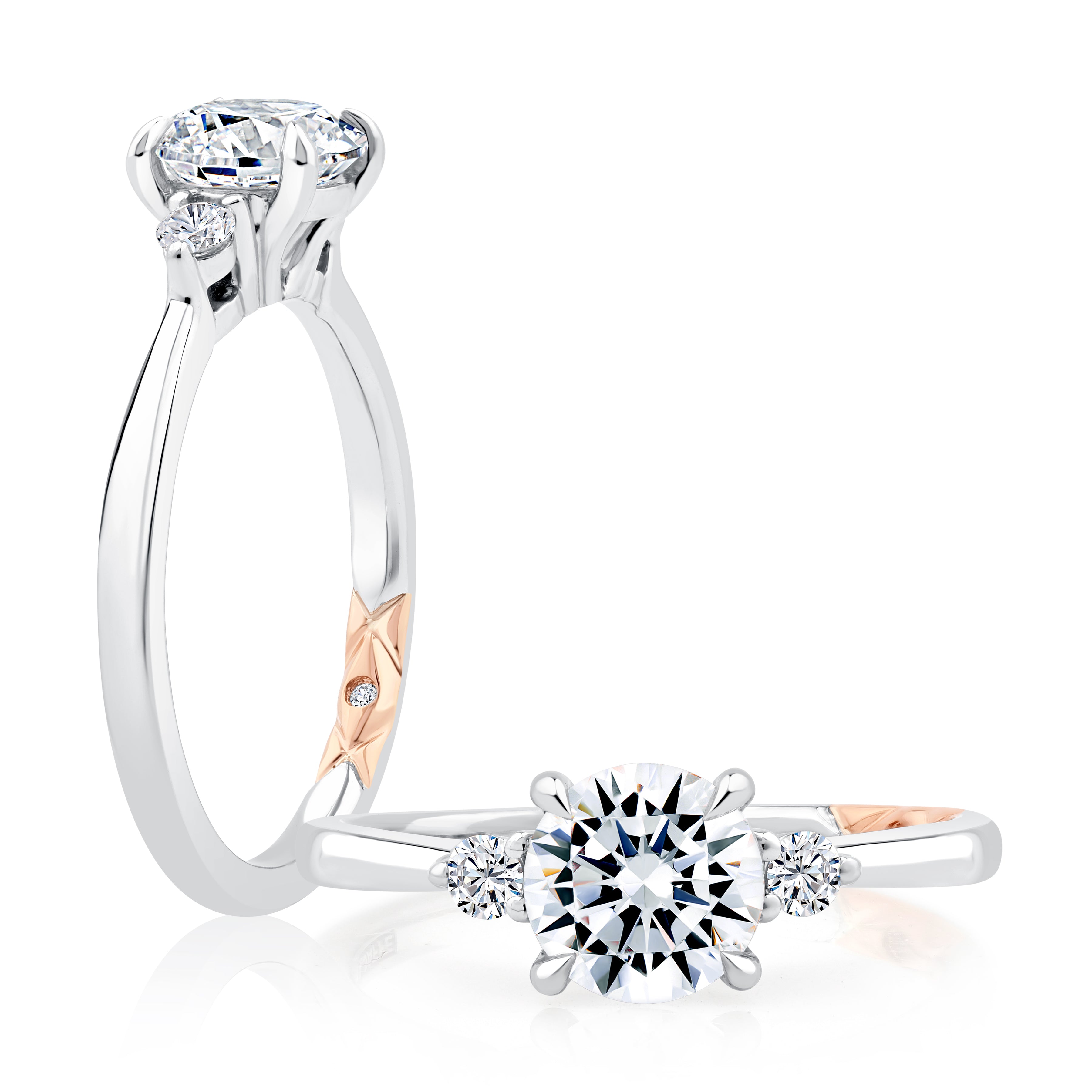 14K white gold three-stone engagement ring setting with a round center diamond, shown standing and lying flat