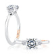 14K white gold three-stone engagement ring setting with a round center diamond, shown standing and lying flat