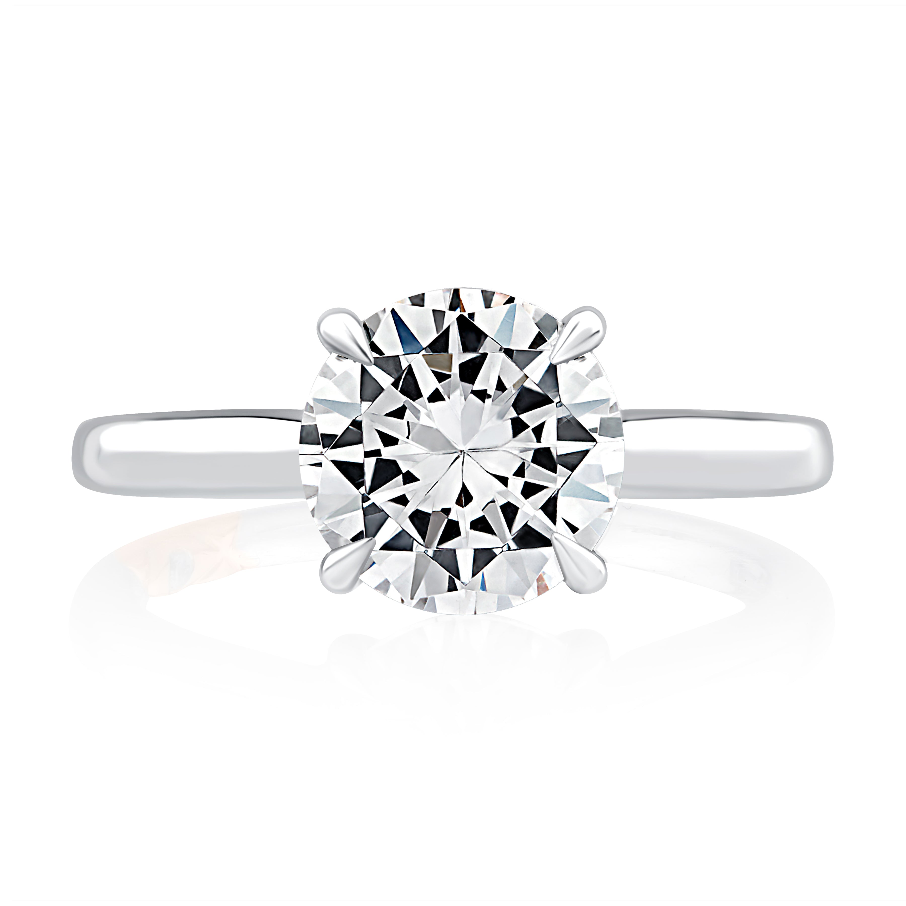 Top view of a 14K white gold four-prong solitaire engagement ring with a round center diamond