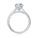 Side view of a 14K white gold engagement ring setting with a pave diamond band
