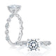 14K white gold engagement ring setting with diamonds along the band and a round center diamond, shown standing and lying flat
