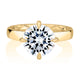 Top view of a 14K yellow gold solitaire engagement ring with a round center diamond
