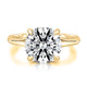 Top view of a 14K yellow gold four-prong hidden halo engagement ring with a round center diamond