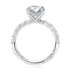 Side view of a 14K white gold engagement ring setting with a shared prong diamond band