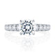 Top view of a 14K white gold engagement ring setting with a round center diamond