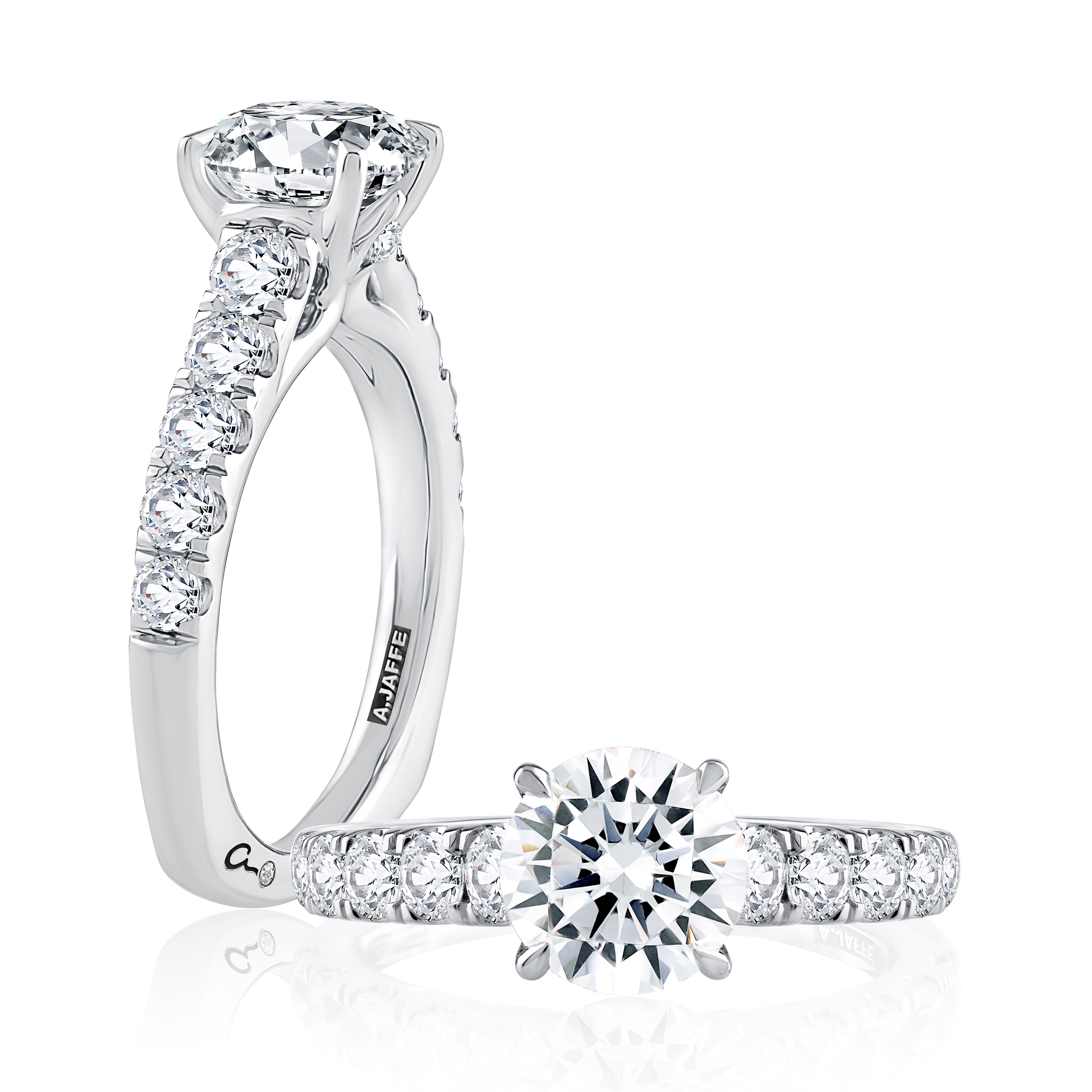 14K white gold engagement ring setting with a diamond band and a round center diamond, shown standing and lying flat