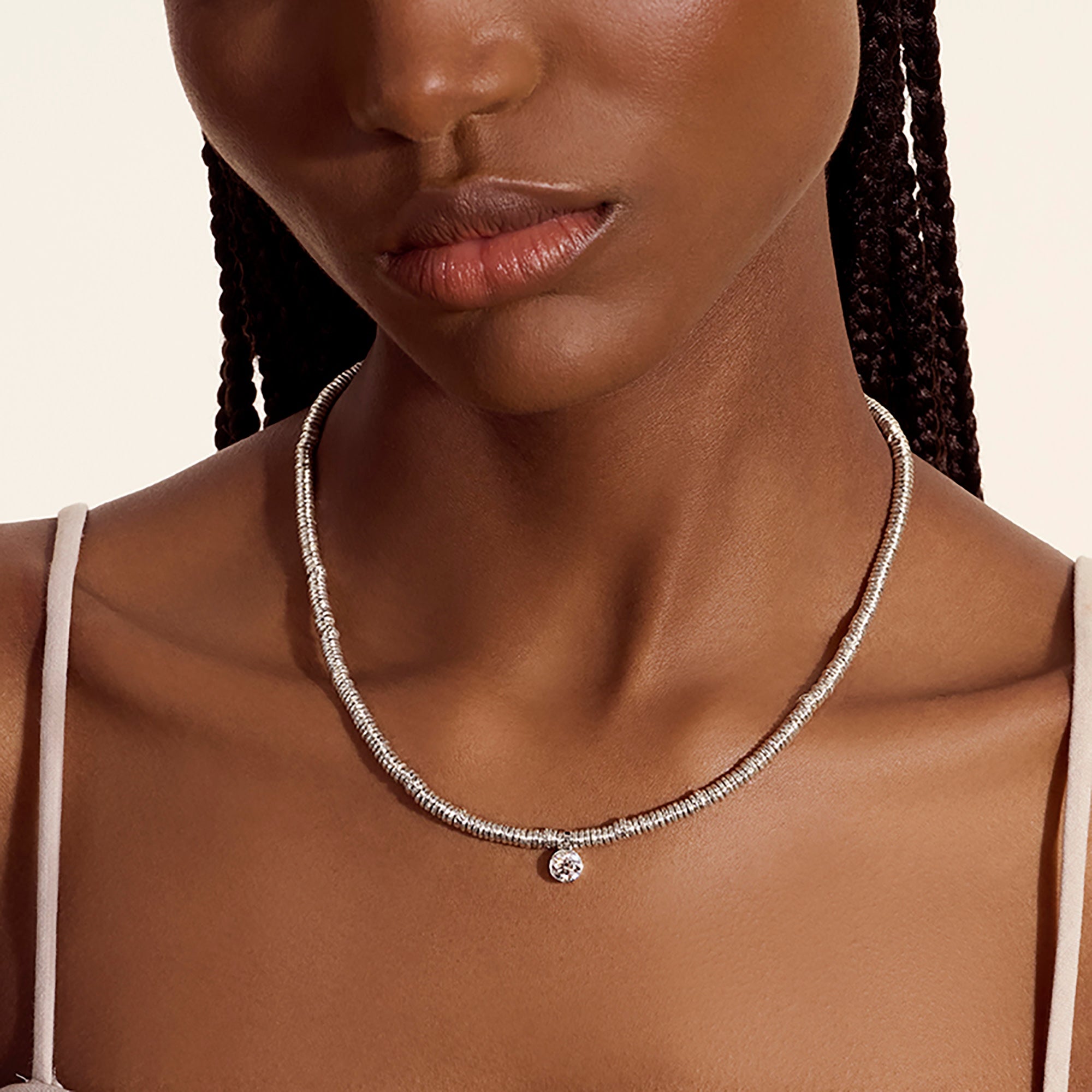 Model wearing the John Hardy Lovestruck Heishi pendant necklace