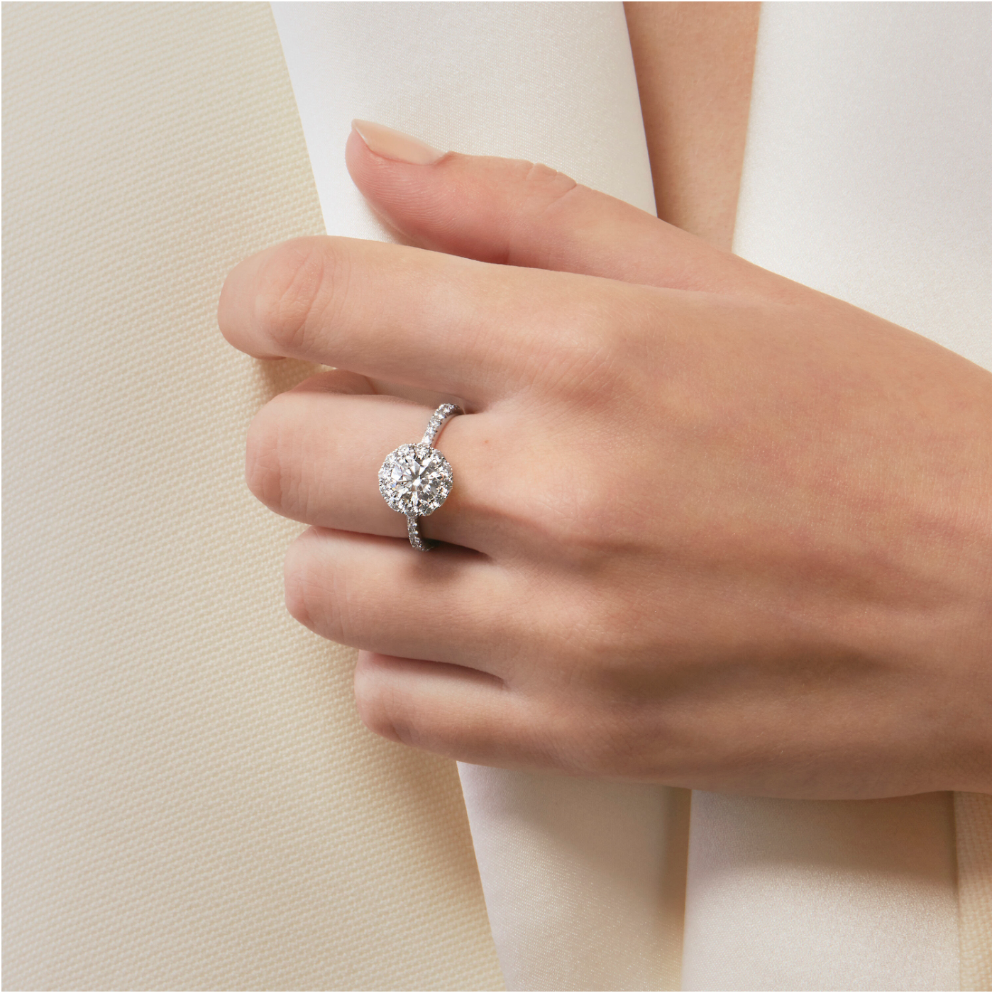 Vela Halo Engagement Ring with Diamond Band