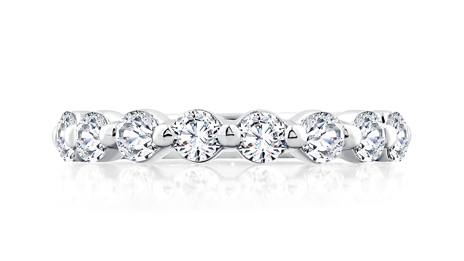Top view of a 14K white gold wedding band with round diamonds set halfway around