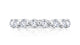 Top view of a 14K white gold wedding band with round diamonds set halfway around