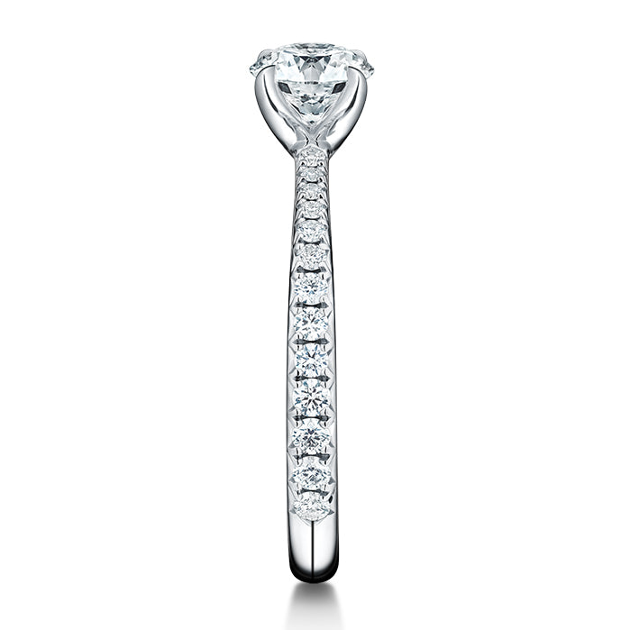Vela Solitaire Engagement Ring with Diamond Band